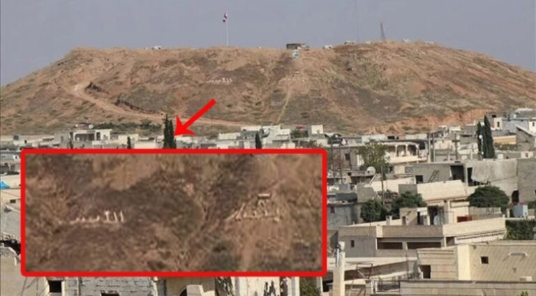 PKKê navê Beşar Esed û Ala Sûriyê li navçeyekî Rojavayê Kurdistanê bilind kir