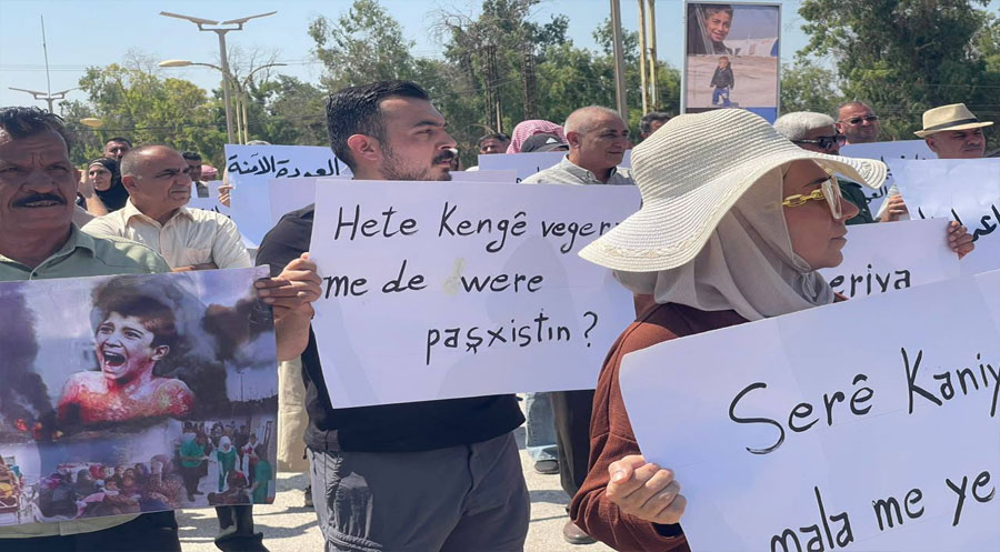 Hesekê: Koçberên Serê Kaniyê daketin kolanan û daxwaza vegereke ewleh kirin